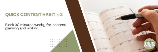 Person's hand up close writing on a calendar